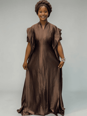 Mocha brown satin boubou gown with wide sleeves and adjustable waist ties on grey studio background