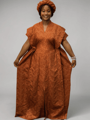 Copper brown 3D floral gown with raised floral texture and adjustable waist ties on grey studio background
